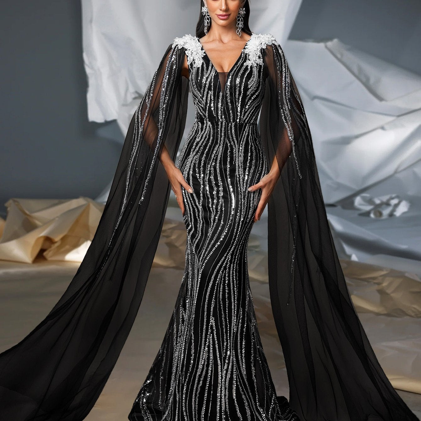 Elegant Black V-Neck Gown with White Floral Embellishments and Flowing Sleeves - Beaded Long Evening Dress for Women, Perfect for Formal Events, Formal Evening Wear | Sophisticated Style | Intricate Beadwork